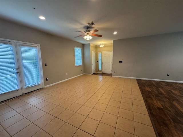 253 Eagle Brook Ln, Buda, TX 78610 - spare room with ceiling fan, recessed lighting, and light tile patterned floors