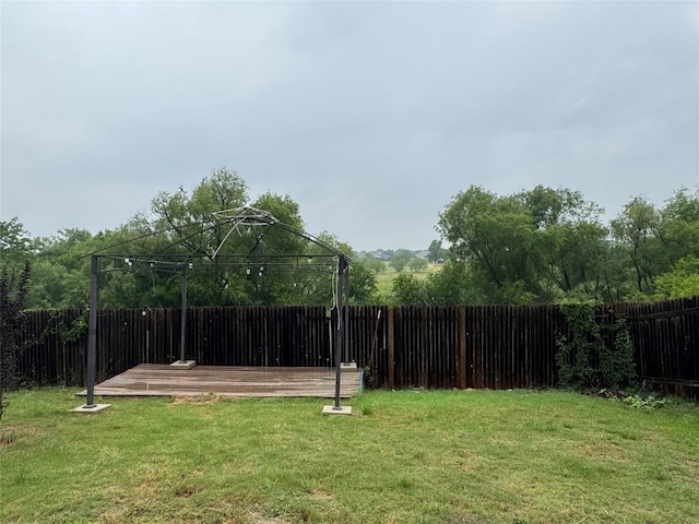 253 Eagle Brook Ln, Buda, TX 78610 - fenced backyard with a gazebo and a wooden deck