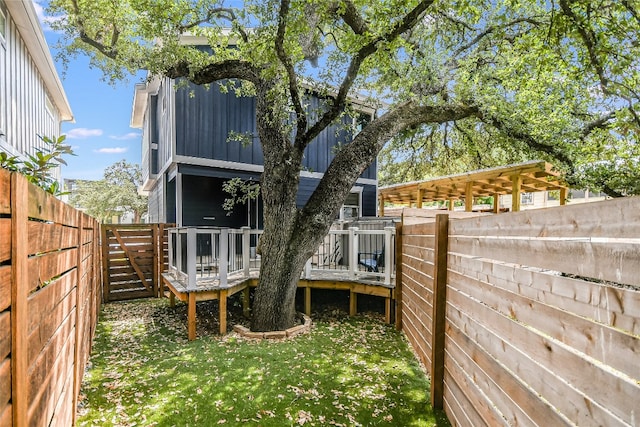 back of property with a deck
