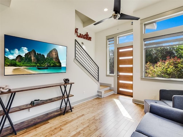 614 Terrell Hill Dr Unit B, Austin, TX 78704 - entryway featuring wood finished floors, plenty of natural light, stairway, ceiling fan, and recessed lighting