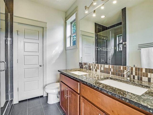614 Terrell Hill Dr Unit B, Austin, TX 78704 - full bath with a shower stall, double vanity, tile patterned floors, and recessed lighting