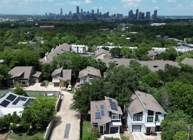 aerial view of residential area featuring a skyline view