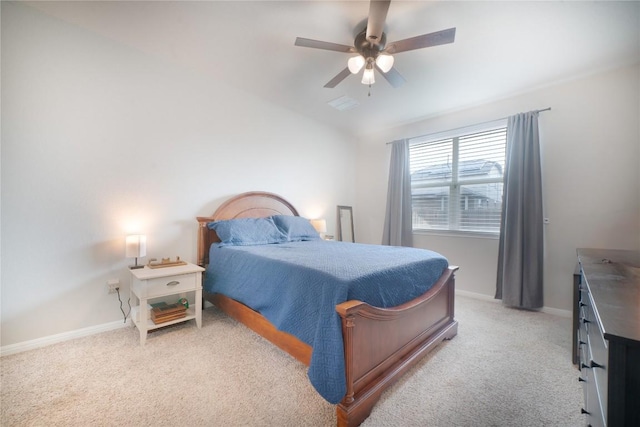 bedroom with light carpet, baseboards, and a ceiling fan