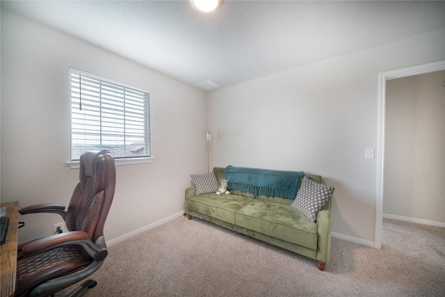 office space with carpet floors and baseboards