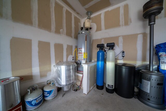utility room with gas water heater