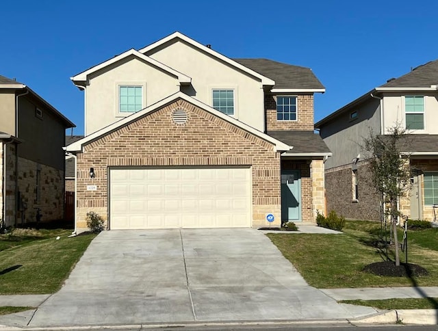 traditional home with concrete driveway, brick siding, a front yard, and a shingled roof