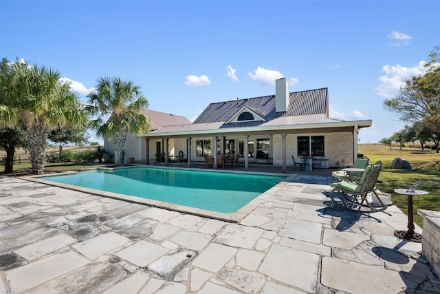 155 Gabriel Farms Dr, Hutto, TX 78634 - swimming pool featuring a patio