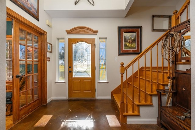 155 Gabriel Farms Dr, Hutto, TX 78634 - entrance foyer with stairway, baseboards, and tile patterned flooring