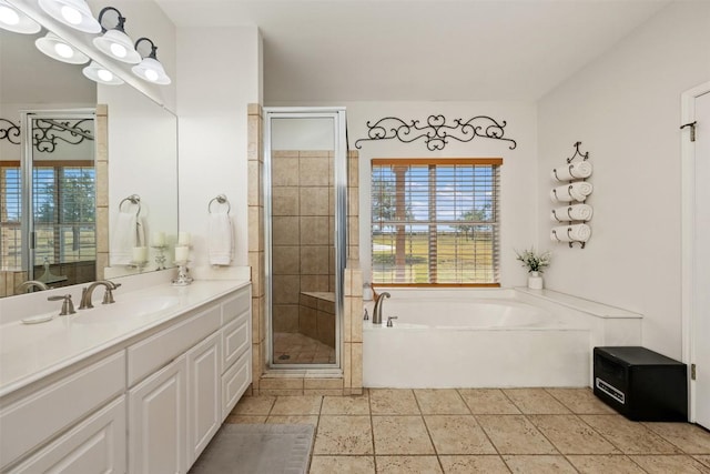 155 Gabriel Farms Dr, Hutto, TX 78634 - full bathroom featuring healthy amount of natural light, a stall shower, a garden tub, and vanity