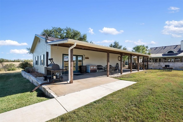 155 Gabriel Farms Dr, Hutto, TX 78634 - view of front of house featuring french doors and a patio