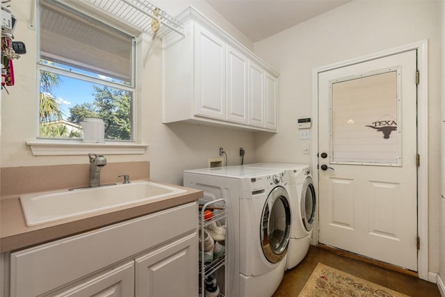 155 Gabriel Farms Dr, Hutto, TX 78634 - washroom with cabinet space and washing machine and dryer