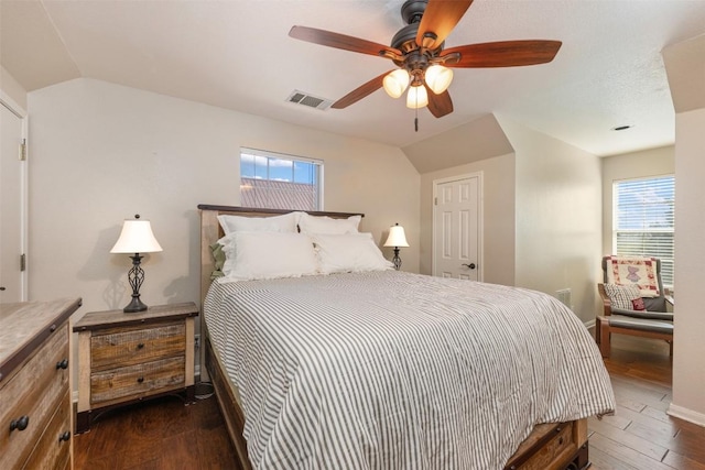 155 Gabriel Farms Dr, Hutto, TX 78634 - bedroom with dark wood finished floors, ceiling fan, and baseboards