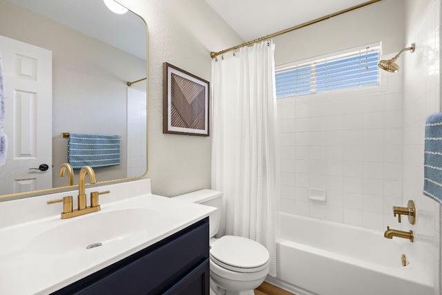 full bathroom with shower / tub combo with curtain, toilet, and vanity