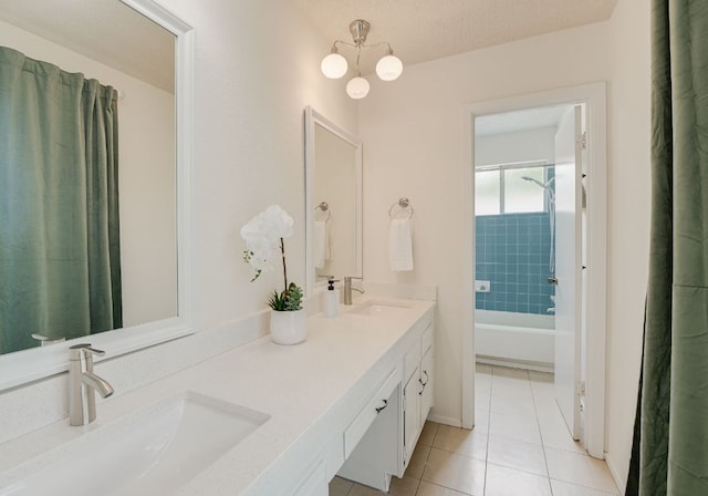 4702 White Elm Dr, Austin, TX 78749 - full bath featuring double vanity, tile patterned flooring, and shower / tub combo