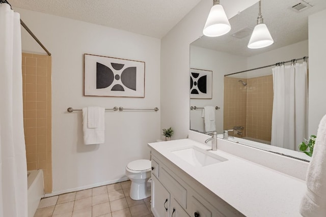 4702 White Elm Dr, Austin, TX 78749 - full bathroom with vanity, tile patterned floors, shower / tub combo, and a textured ceiling
