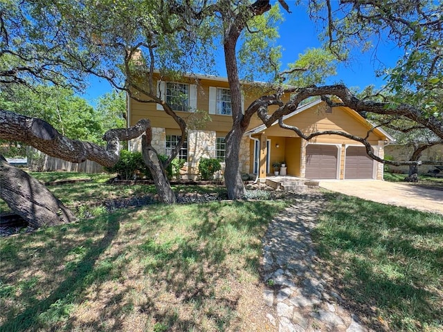 4702 White Elm Dr, Austin, TX 78749 - view of front of property with stone siding, a garage, and driveway