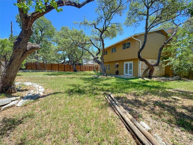 4702 White Elm Dr, Austin, TX 78749 - view of yard featuring french doors