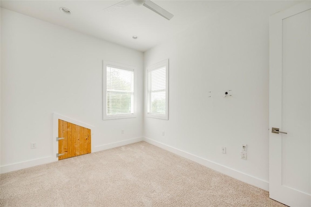 1305 Village W Dr, Austin, TX 78733 - carpeted spare room featuring baseboards and ceiling fan