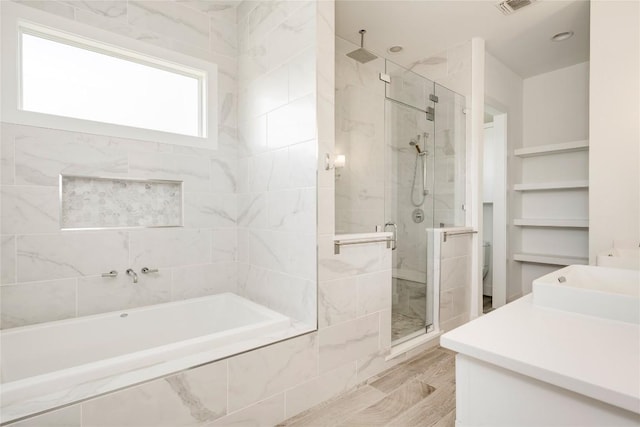 1305 Village W Dr, Austin, TX 78733 - full bath with a marble finish shower, a garden tub, and vanity