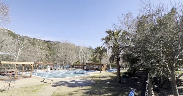 1305 Village W Dr, Austin, TX 78733 - community pool with a patio