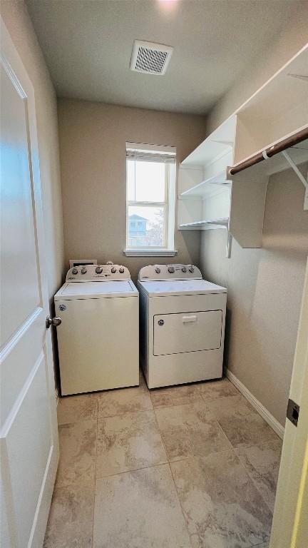 310 Dipprey Ln, Georgetown, TX 78628 - laundry room with independent washer and dryer