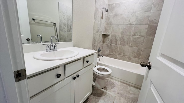 bathroom featuring vanity, toilet, and bathing tub / shower combination