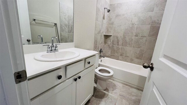 310 Dipprey Ln, Georgetown, TX 78628 - full bath featuring vanity, toilet, and shower / tub combination