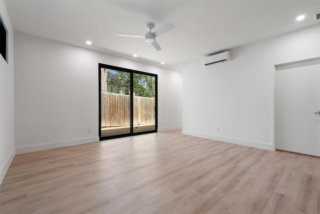 2107 Maple Ave Unit B, Austin, TX 78722 - empty room featuring a wall mounted AC, ceiling fan, light wood finished floors, recessed lighting, and baseboards