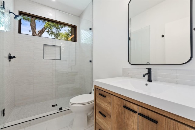 2107 Maple Ave Unit B, Austin, TX 78722 - bathroom with vanity, toilet, a stall shower, and tile patterned floors