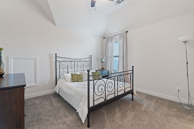 carpeted bedroom featuring vaulted ceiling, baseboards, and a ceiling fan