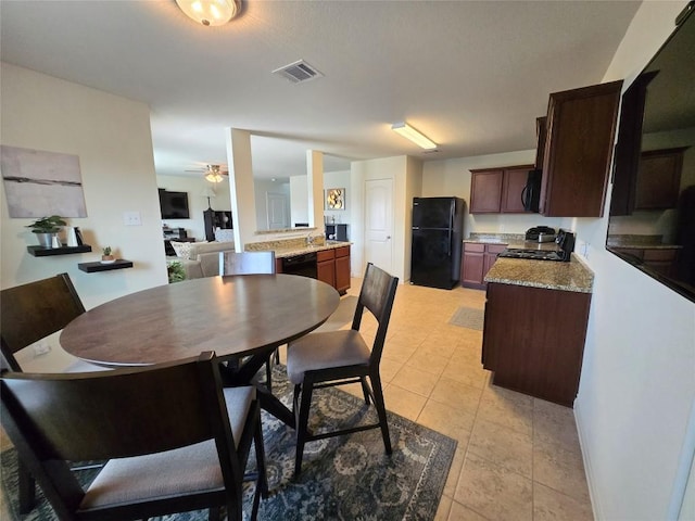 336 Farmer Ln, Jarrell, TX 76537 - dining area featuring ceiling fan and light tile patterned flooring