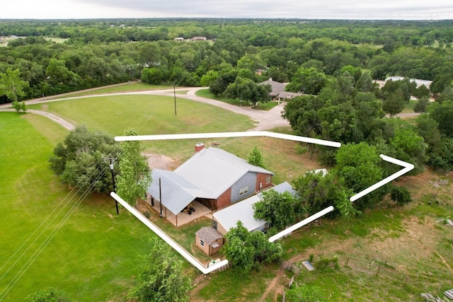 176 Old Lexington Rd Unit C, Elgin, TX 78621 - view from above of property with a heavily wooded area