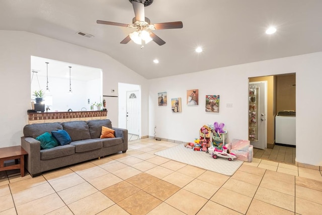 176 Old Lexington Rd Unit C, Elgin, TX 78621 - living room with washer / dryer, vaulted ceiling, ceiling fan, light tile patterned floors, and recessed lighting