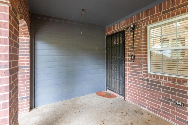 176 Old Lexington Rd Unit C, Elgin, TX 78621 - property entrance featuring brick siding and covered porch