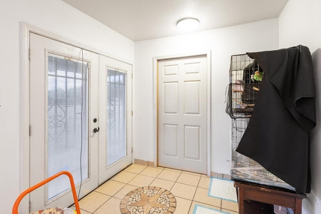 176 Old Lexington Rd Unit C, Elgin, TX 78621 - foyer entrance featuring french doors and light tile patterned floors
