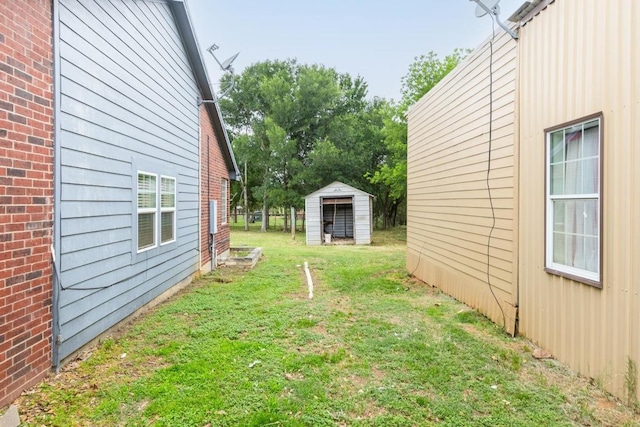 176 Old Lexington Rd Unit C, Elgin, TX 78621 - view of green lawn featuring a storage shed