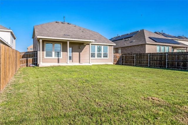 206 Duroc Dr, Hutto, TX 78634 - rear view of house with a patio