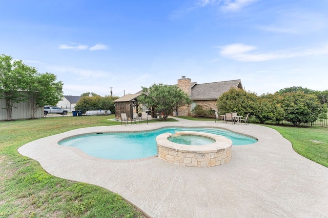 221 Breakaway Rd, Cedar Park, TX 78613 - view of swimming pool featuring a lawn, a patio area, and a pool with connected hot tub