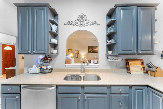 221 Breakaway Rd, Cedar Park, TX 78613 - kitchen with open shelves, stainless steel dishwasher, blue cabinets, a sink, and light countertops