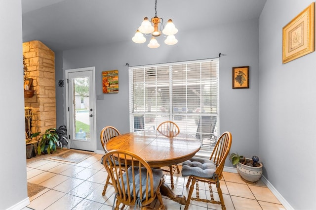 221 Breakaway Rd, Cedar Park, TX 78613 - dining area featuring a chandelier, light tile patterned floors, and baseboards