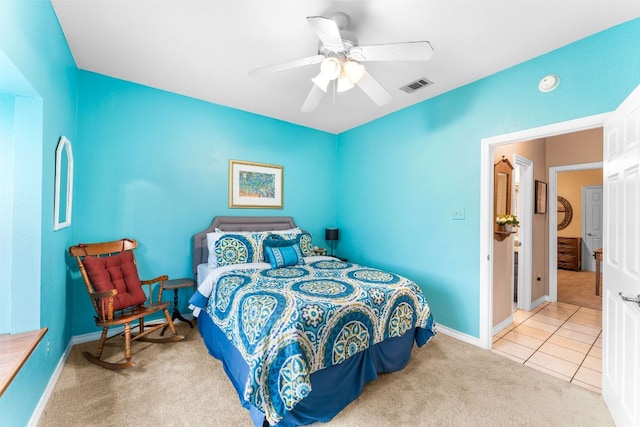 221 Breakaway Rd, Cedar Park, TX 78613 - carpeted bedroom with baseboards, a ceiling fan, and tile patterned flooring