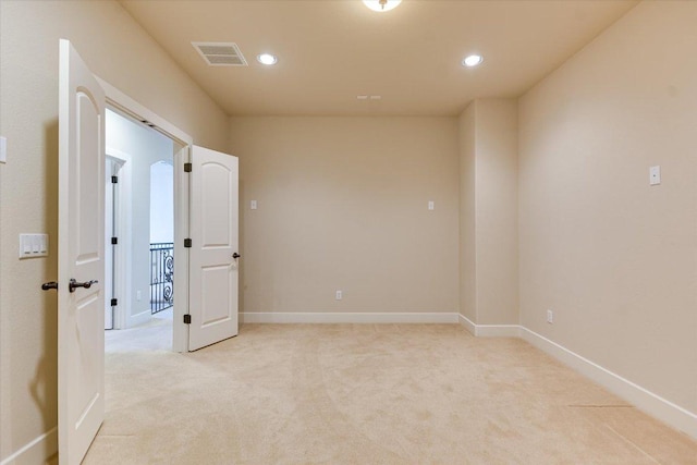 1036 Liberty Park Dr Unit 20, Austin, TX 78746 - spare room with light colored carpet, recessed lighting, and baseboards