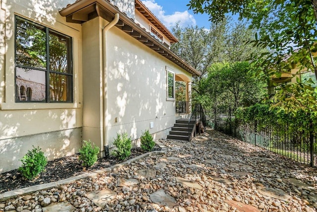 1036 Liberty Park Dr Unit 20, Austin, TX 78746 - view of property exterior featuring fence
