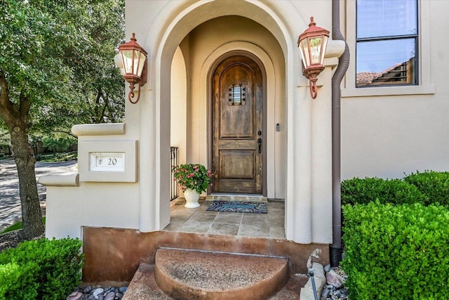 1036 Liberty Park Dr Unit 20, Austin, TX 78746 - entrance to property featuring stucco siding