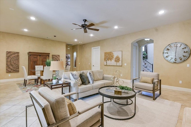 1036 Liberty Park Dr Unit 20, Austin, TX 78746 - living room featuring arched walkways, recessed lighting, a ceiling fan, light tile patterned floors, and baseboards