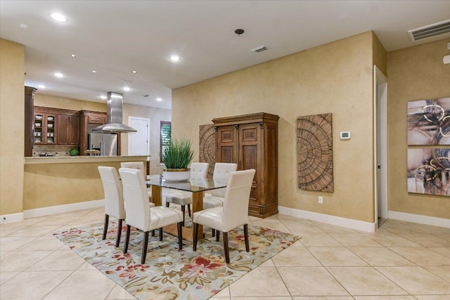 1036 Liberty Park Dr Unit 20, Austin, TX 78746 - dining space featuring light tile patterned flooring, recessed lighting, and baseboards