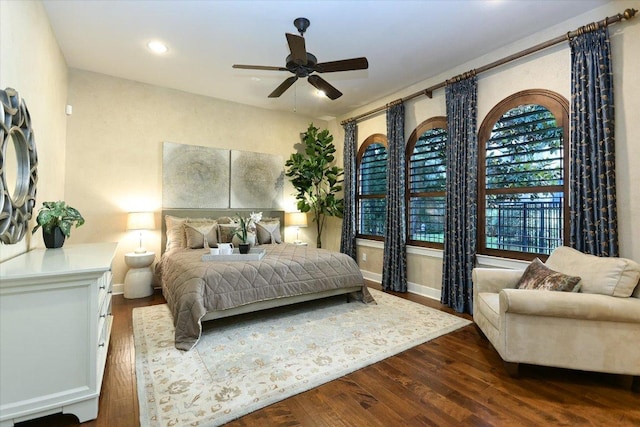 1036 Liberty Park Dr Unit 20, Austin, TX 78746 - bedroom with wood finished floors, baseboards, recessed lighting, and a ceiling fan