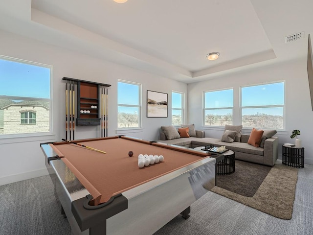 rec room featuring a tray ceiling, carpet, pool table, and baseboards