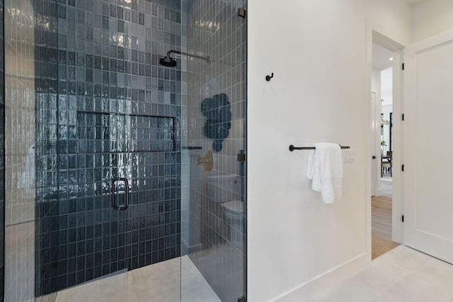 2304 W 8th, Austin, TX 78703 - bathroom with a stall shower and baseboards