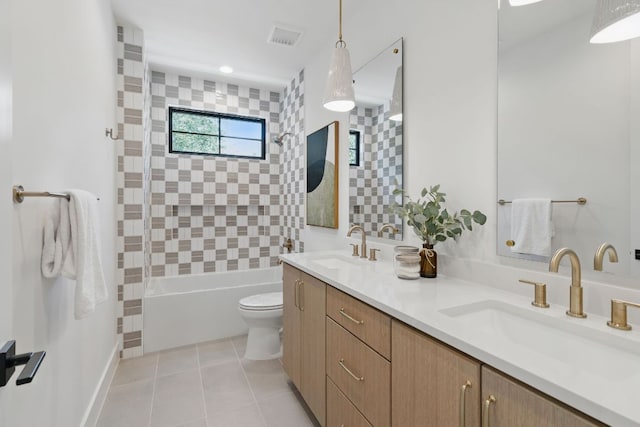 full bathroom with toilet, double vanity, bathing tub / shower combination, tile patterned flooring, and baseboards